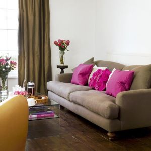 Pink interior design - myLusciousLife.com - Chocolate and Pink living room via House to Home.jpg